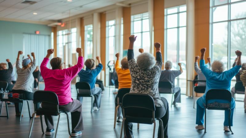 elderly exercise group sitting in chairs